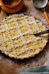 lattice flan with custard and pine nuts. top view.