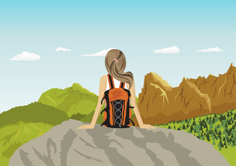 woman traveler sitting on rocks looking at mountains