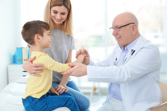 Little boy with mother at orthopedist's office