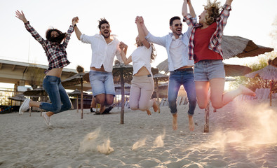 Group of happy young people enjoying summer vacation