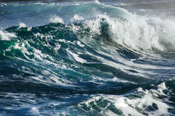 Big stormy ocean wave. Blue water background