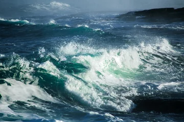Photo sur Aluminium Eau Big stormy ocean wave. Blue water background