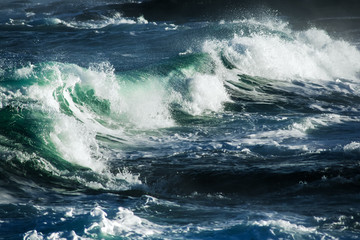 Big stormy ocean wave. Blue water background