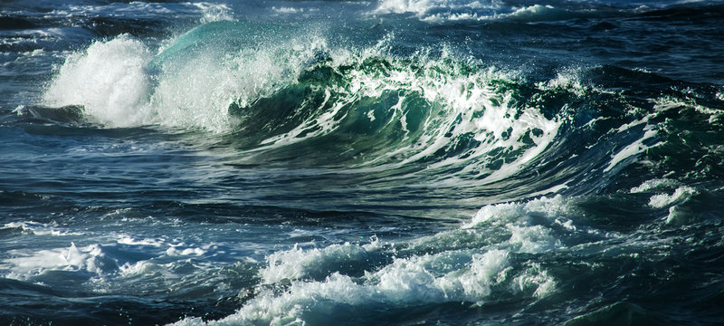 Big stormy ocean wave. Blue water background © Ivan Kurmyshov