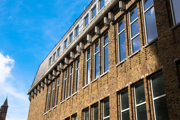high building with a blue sky background