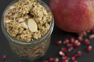 Healthy Breakfast Granola with Nuts and Pomegranate Seeds