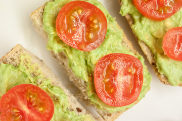 healthy sandwiches with guacamole and tomato