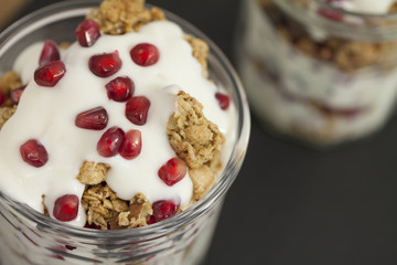 Yogurt and Granola Parfait with Pomegranate Seeds and Almond Yogurt