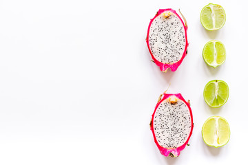 pattern with sliced kiwi and pitaya on white background top view mockup