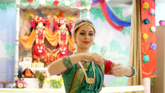 A lovely young woman in traditional dance costume