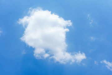 White clouds have the blue sky as the background.