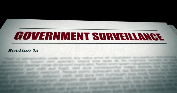 Camera pans over Government Surveillance government Bill document