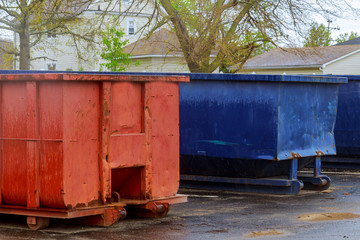 Industrial garbage container on construction site