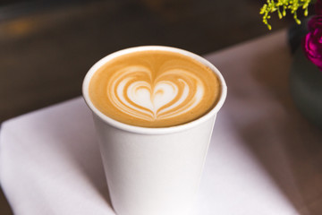 Coffee in Paper Cup with Heart Design