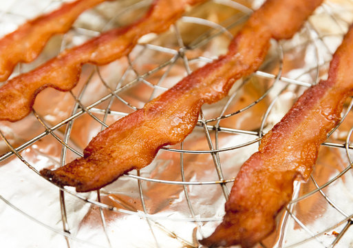 Strips of Bacon Cooling on Rack