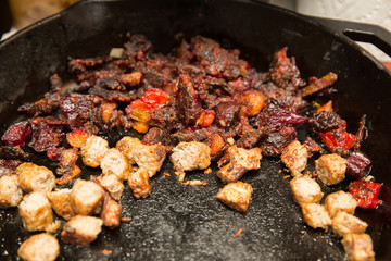 Fried Potatoes and Veggies in Skillet