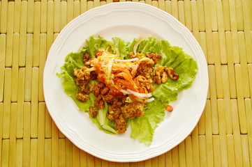 crispy fried minced catfish with green mango dressing sweet and sour sauce salad 