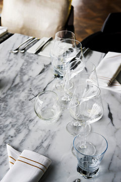 Glasses on Table set prepared for dinner