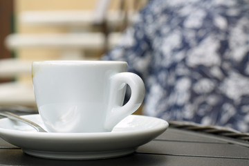 White coffee cup on table