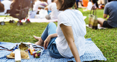 Adult Woman Sitting Picnic in The Park
