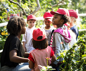 Teacher and kids school learning ecology gardening