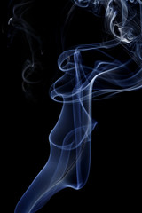 Abstract white blue smoke from aromatic sticks.