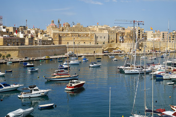 Fototapeta na wymiar The view of Post of Castile from Kalkara over the Kalkara creek. Malta