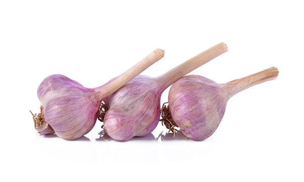 Fresh young garlic isolated on white background