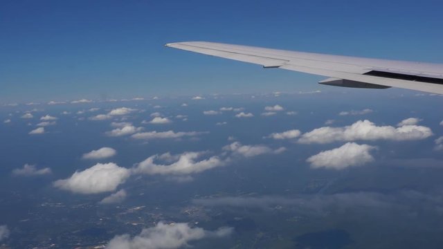 Traveling by air. View through an airplane