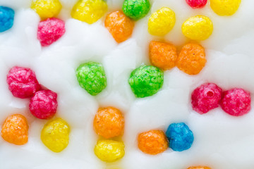 Balls of different colors on a white glaze.Background.