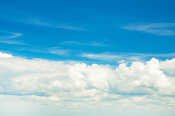 white fluffy clouds in the blue sky