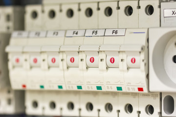 Circuit breakers and socket in the switchboard.