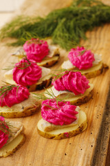 Potatoes cakes with red creamy and cummin