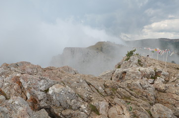 Fototapeta na wymiar Fog over the rocks of Ai Petri