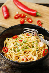 Spaghetti with soy sauce and shrimps red chili