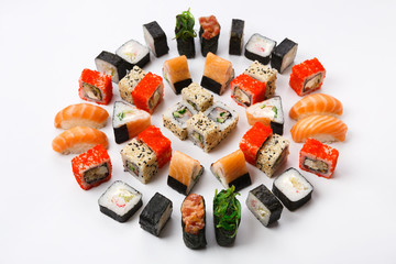 Set of sushi, maki and rolls isolated on white background © Prostock-studio