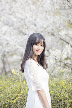 Spring portrait of a beautiful Asian girl 