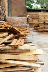 Pile of teak wood at woodyard in suburb factory, Northern Thailand