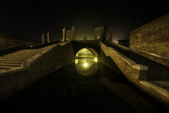 Triple-bridge, Ponte dei Trepponti, called Ponte Pallotta,famous bridge in Comacchio town, Italy
