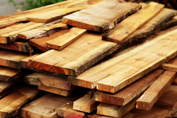 Pile of teak wood at woodyard in suburb factory, Northern Thailand