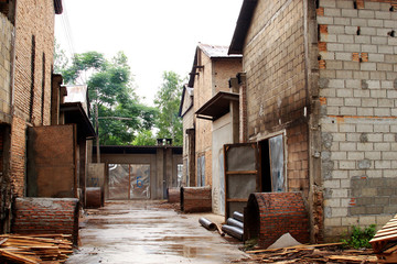 Wood factory building by old brick at the Northern Thailand