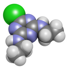 Simazine herbicide molecule. 3D rendering. Atoms are represented as spheres with conventional color coding: hydrogen (white), carbon (grey), chlorine (green), nitrogen (blue).