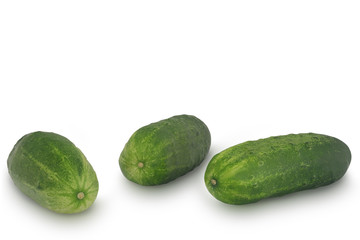 Three cucumbers isolated on white background