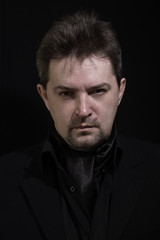 Obraz premium Man in black