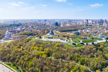 Fototapeta na wymiar Panoramic view of the city of Kiev. Mother Land and Park of Glory view. Aerial view, from above. Outdoor.