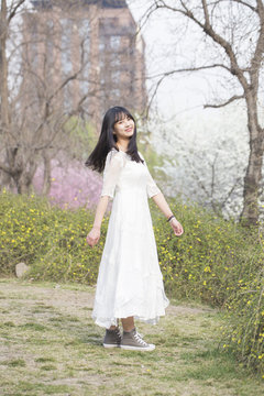 Spring portrait of a beautiful Asian girl 