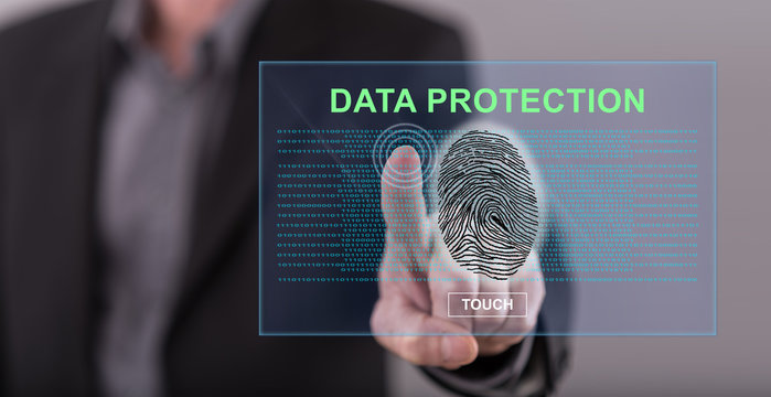 Man touching a data protection concept on a touch screen