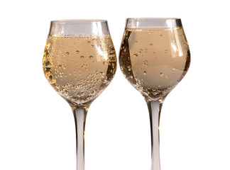 Champagne in wineglass on white background