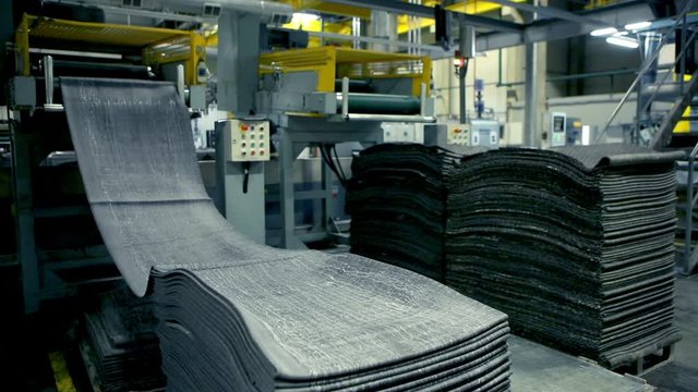 A machine producing tyres out of recycled rubber
