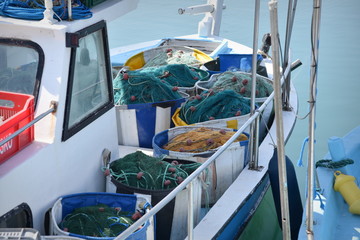 Fototapeta na wymiar fishing nets on fishing boat in Cyprus 